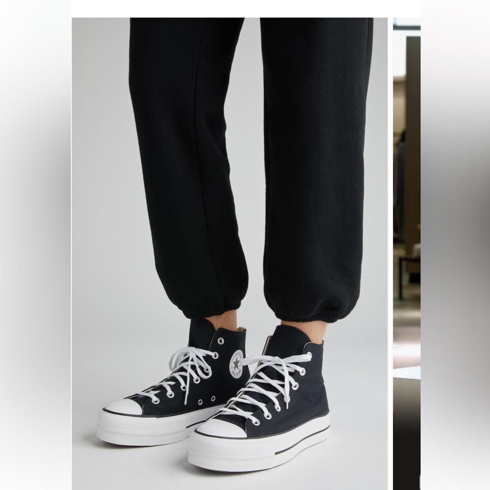 Converse women’s black and white white platforms shoes